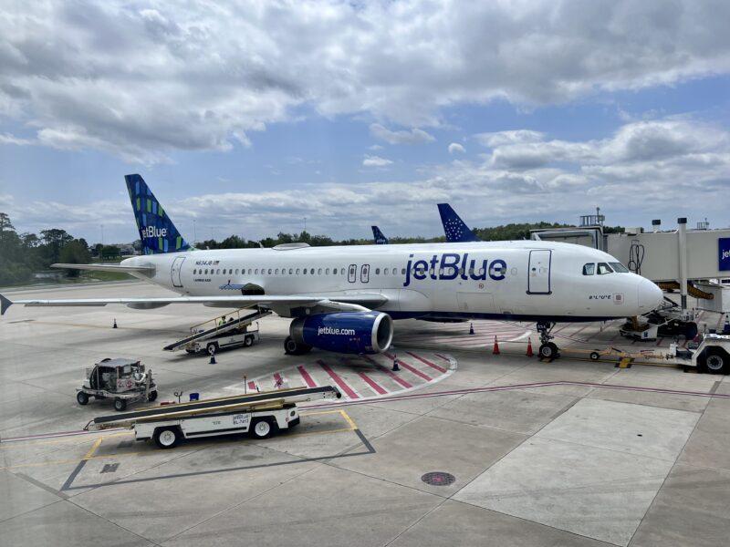 Airplane parked at airport gate