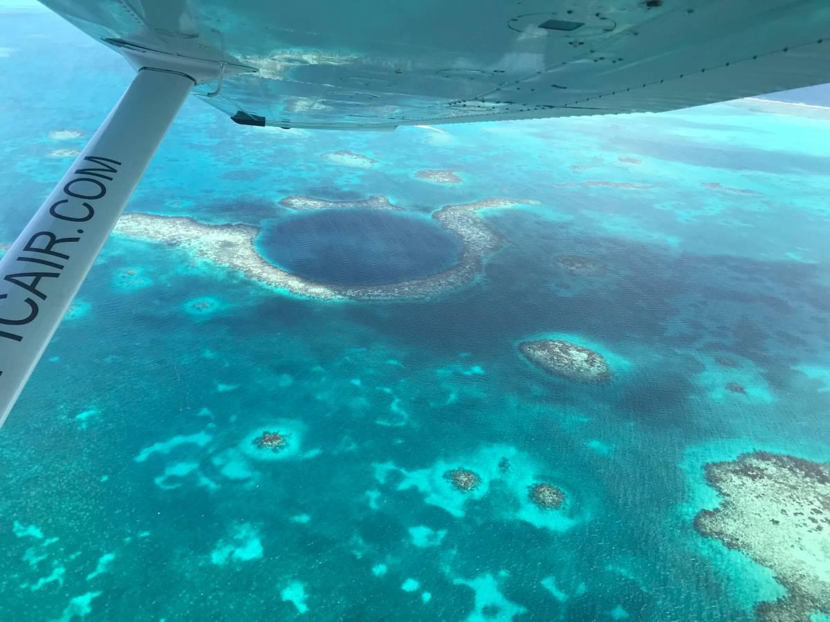 Taking a Scenic Flight Over the Great Blue Hole with Tropic Air Belize