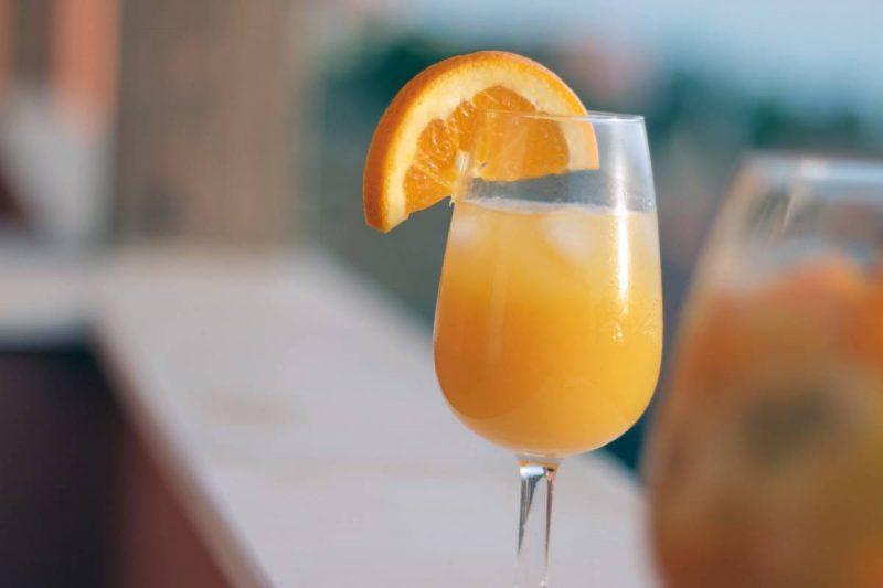 Mimosa with orange garnish