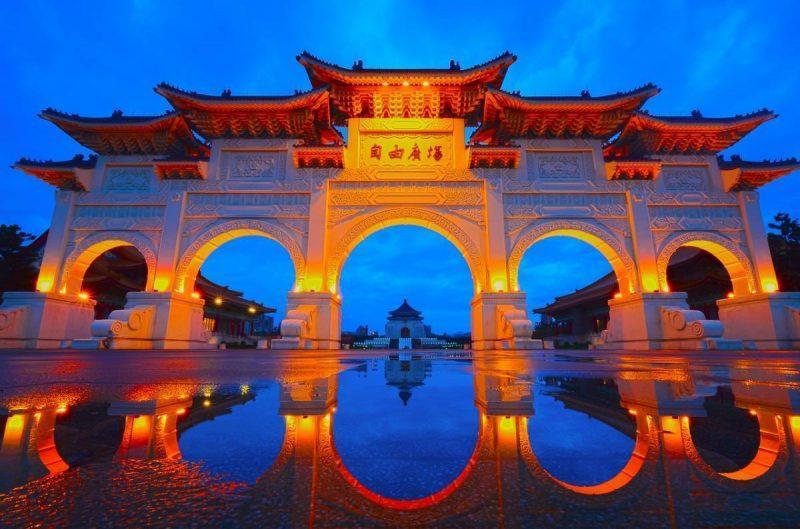 Temple gates lit up at night