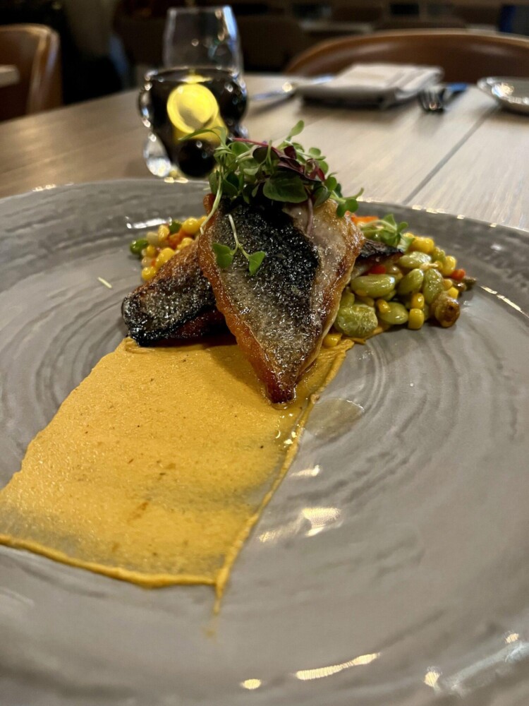 Crispy branzino with corn and legume succotash