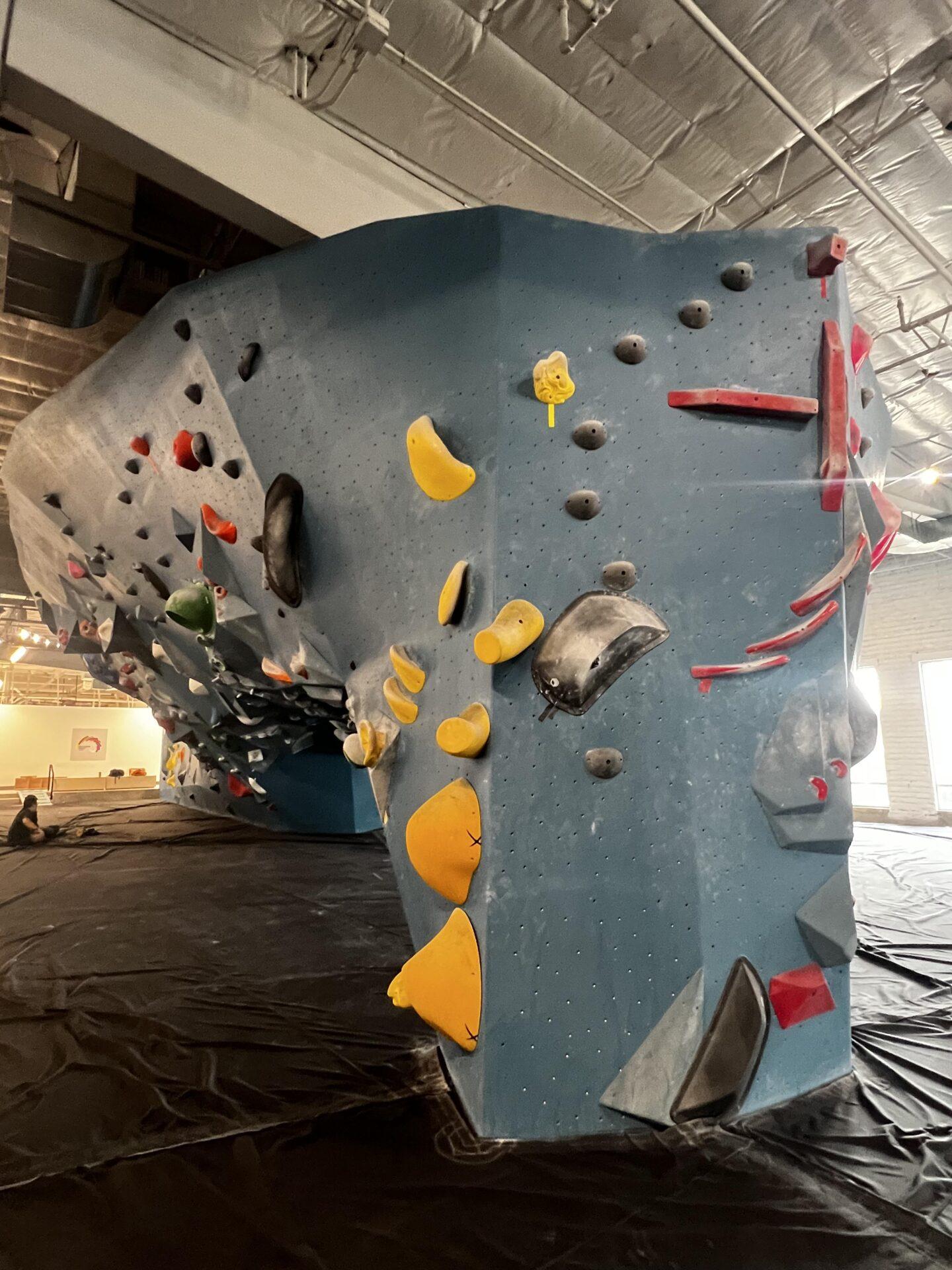Rock wall with varying colors of blocks