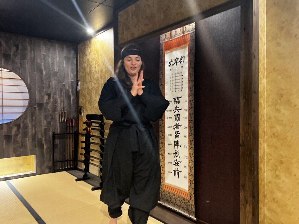 Woman attempting Ninja hand meditation