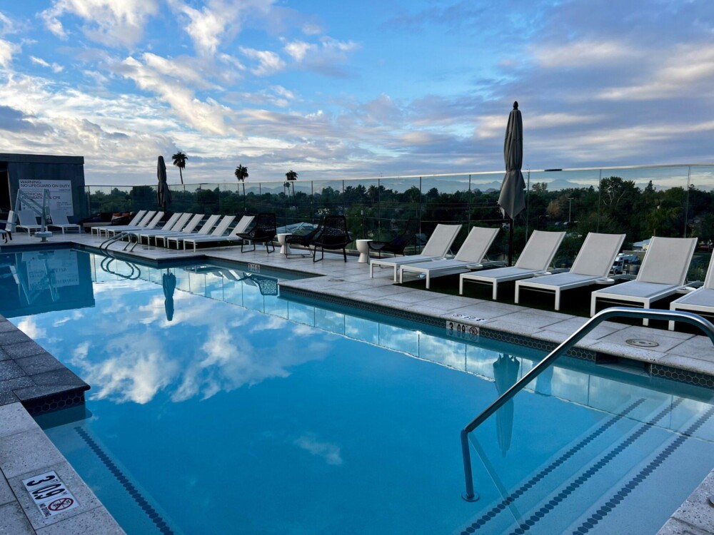 Rooftop pool with blue skies