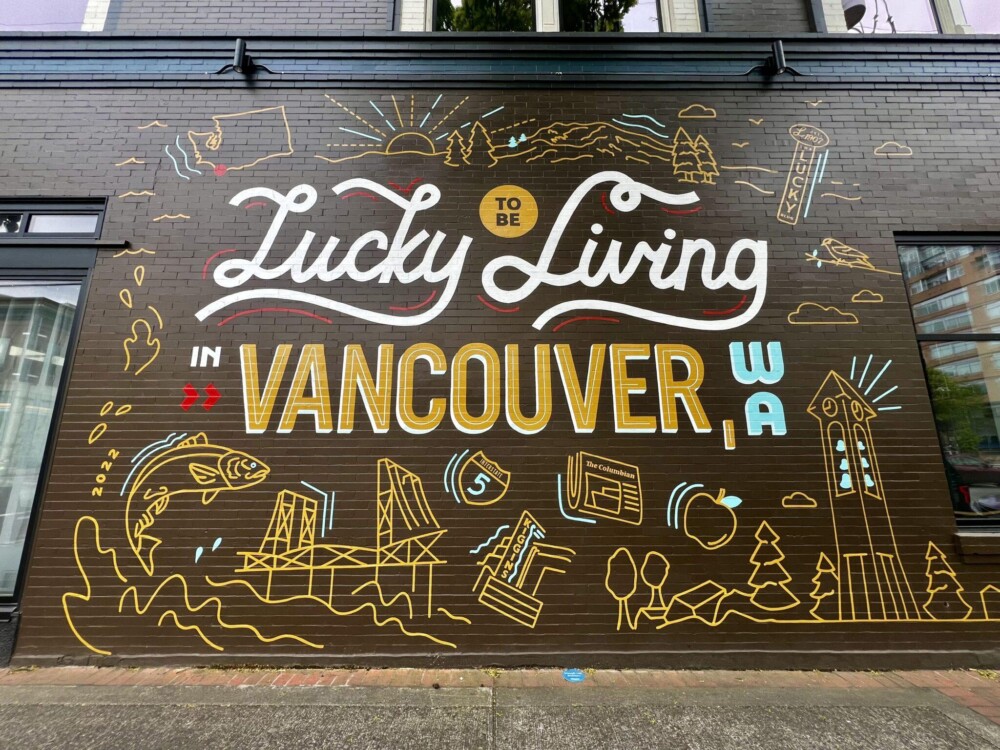 Lucky to be Living in Vancouver brown and yellow mural