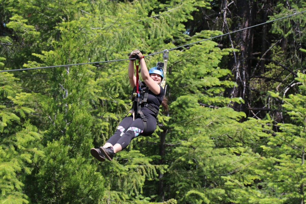 Woman smiling on zipline canopy tour
